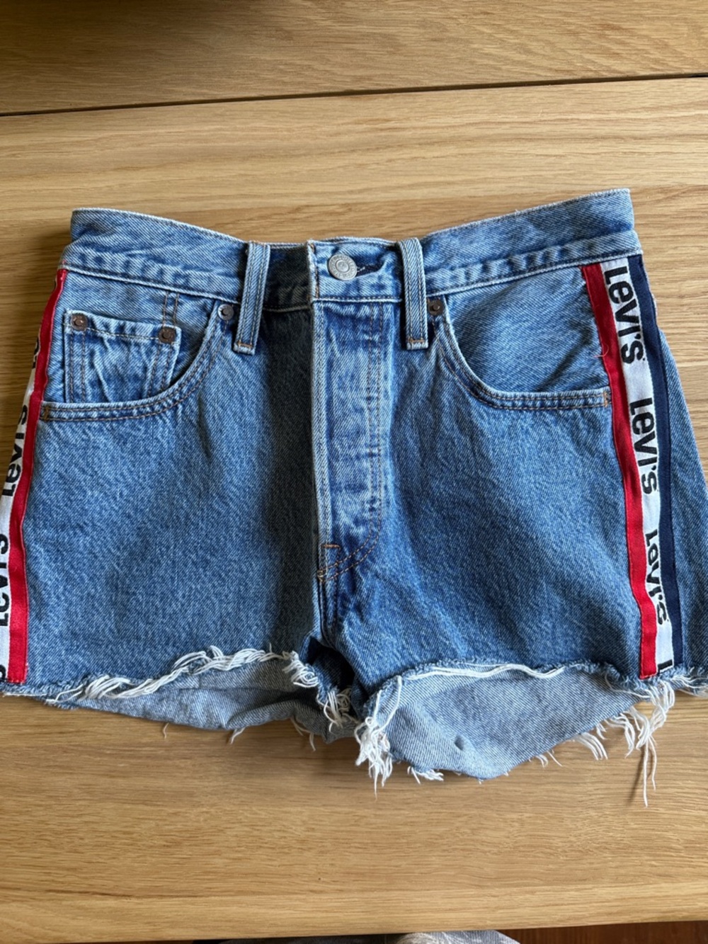 Levi's Blue Denim Cutoff Shorts with Red and White Side Tape